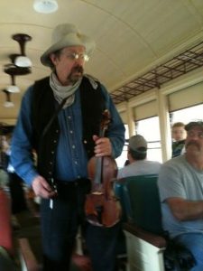 A Traditional Combination Of Trains, Music and Singing