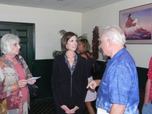 Olsen Talks With Business Leaders