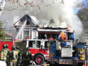 Two Burned Buildings Come Down