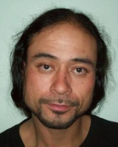 Guns And Drugs Led To Parolee’s Arrest