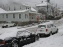 Snow covered cars in downtown Sonora