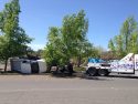 Big Rig without trailer into pickup truck on its side near TUD