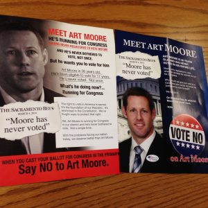 Moore’s Voting Record Questioned