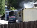Single Wide Mobile Home Fire Damage Photo by Sabrina Ambler