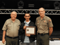 Grant Travers (center) accepts the Individual Youth Volunteer Award for his excellent work ethic, high quality of work, and eagerness to assist. The award was presented by Ken Stowell, Yosemite National Park Maintenance Mechanic Supervisor (left) and Mike Gauthier, Yosemite National Park Chief of Staff (right).