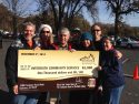 Clarke Broadcasting Cash and Coat Drive and Santa Fly-In for Interfaith with Black Oak Casino Resort General Manager Ron Patel giving a donarion