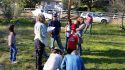 Archaeologist Shelly Davis-King, with interested school personnel, students and families, surveying the 1915 school site where there will be an archaeological survey.