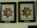 Empty frames on the SPD's Wall of Chiefs-
