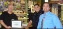 Plaque given to The Sportsman store by the Sonora Police Officer’s Association (From left to right: Steve Kane of the Sportsman, Officer J. Bowly (SPOA Vice-President), Detective I. Khalil (SPOA President)