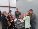 Sierra Bible Church volunteers, about 75 in number, help with packing ahead of the ATCAA Food Bank Thanksgiving Distribution 2015