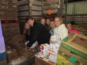 Sierra Bible Church volunteers, about 75 in number, help with packing ahead of the ATCAA Food Bank Thanksgiving Distribution 2015