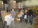 Sierra Bible Church volunteers, about 75 in number, help with packing ahead of the ATCAA Food Bank Thanksgiving Distribution 2015