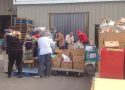 The Resource Connection during a Santa's Express packing activity with volunteers, 2014