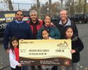 Black OBlack Oak Casino Resort donation (Middle left-to-right in black and red coat, Black Oak CEO Ron Patel, Interfaith Director Cathie Peacock, Clarke Broadcasting General Manager Larry England, along with Tuolumne Band of Me-Wuk tribe members)