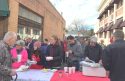 Mutz' Bean Feed 2015 serving line stretches across Linoberg Street in front of food prep area
