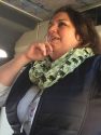 PAWS Keeper-Caretaker Michele Franko climbs into a shuttle to greet Holiday Open House