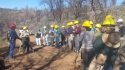 Rim Fire replanting volunteer planting lead Kim Williams instructs volunteers.