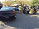 Medics and fire personnel tending to a critical patient at the "Every 15 Minutes" program