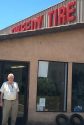 Don Smyth, longtime owner of Tweedy Tire, at the front door