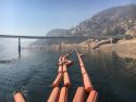 Booms in water under the HWY 120/James E. Roberts Bridge