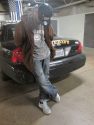 Andrew John Labriola next to patrol car