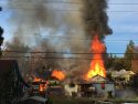 Two structures burn on South Washington Street