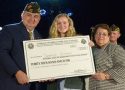 VFW National Commander Brian Duffy and VFW Auxiliary President Colette Bishop present Savannah Wittman with her $30,000 award.