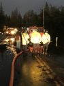 Fire truck pumping flood waters from Parrotts Ferry Road