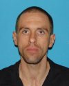 Justin Mendenhall, TCSO Booking Photo