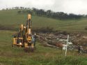 Equipment ready to remove portions of Bonds Flat Road