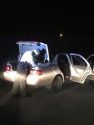 Deputy searching car after traffic stop