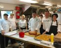 Columbia College's Klaus Tenbergen and Culinary program students holding down the Posse Clubhouse kitchen during the Leadership Tuolumne 2017 Foster Kids Fundraiser.