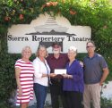 Board members Tracy Russell, Carey Haughy and Dana Mayo of Sonora Area Foundation flank retiring Sierra Repertory Theatre directors Dennis and Sara Jones as they receive the 2017 Irving J. Symons Community Impact Award