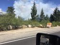 Sign at Donnell Vista with McCormick Fire burning in the background