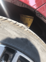 Highway reflector stuck in Kathleen Boone's flat tire, Sept 7 2017