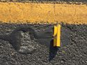 Puzzle of the Punctured Tires, temporary markers using metal Hwy 49-108 Jamestown Sept 7 2017