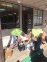 Inmates cleaning and painting the Sheriff's Office Community Service Building in Jamestown