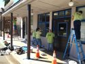 Inmates cleaning and painting the Sheriff's Office Community Service Building in Jamestown