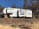 Trailer waste container at eradicated marijuana grow - Rim Rock Valley Road, Mountain Ranch