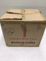 Box full of wax paper wtih concentrated cannabis on it