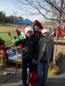 Mrs. Claus and helpers at 2017 Santa-Fly-in and Interfaith Coat Drive