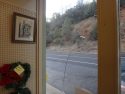 Broken window at the Community Thrift Shop