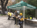 Park Rangers staff interactive and informative booths in front of the Valley Visitor Center.