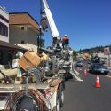 Crew replacing streetlights on South Washington Street in downtown Sonora