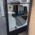 Broken door at the Gold Country Gas station in Sonora
