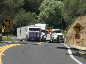 HWY 49 Jackknifed semi at hairpin turn near Tuttletown