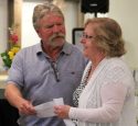 Board President Mark Kraft presents check to Columbia College President Angela Fairchilds