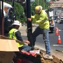 Crew replacing streetlights on South Washington Street in downtown Sonora