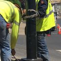 Crew replacing streetlights on South Washington Street in downtown Sonora