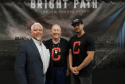 Tuolumne Band of We Wuk Indians Tribal Chief Kevin Day with Jim Thorpe's son Bill Thorpe and actor Martin Sensmeir in front of Bright Path The Jim Thorpe Story background